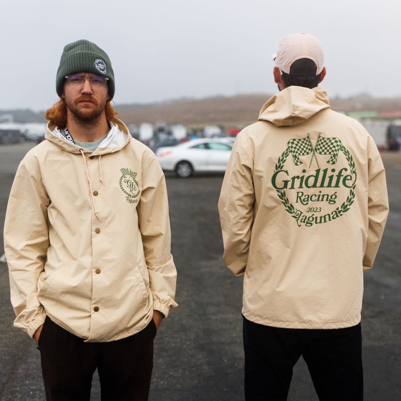 GRIDLIFE racing Laguna crest rain jacket being worn by two handome fellows