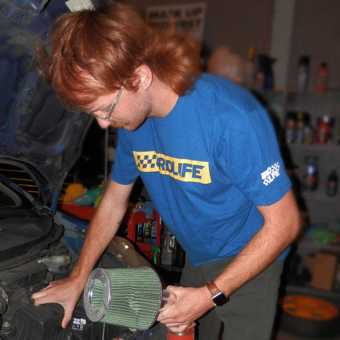 GRIDLIFE blue box logo t shirt being while working on Honda fit 
