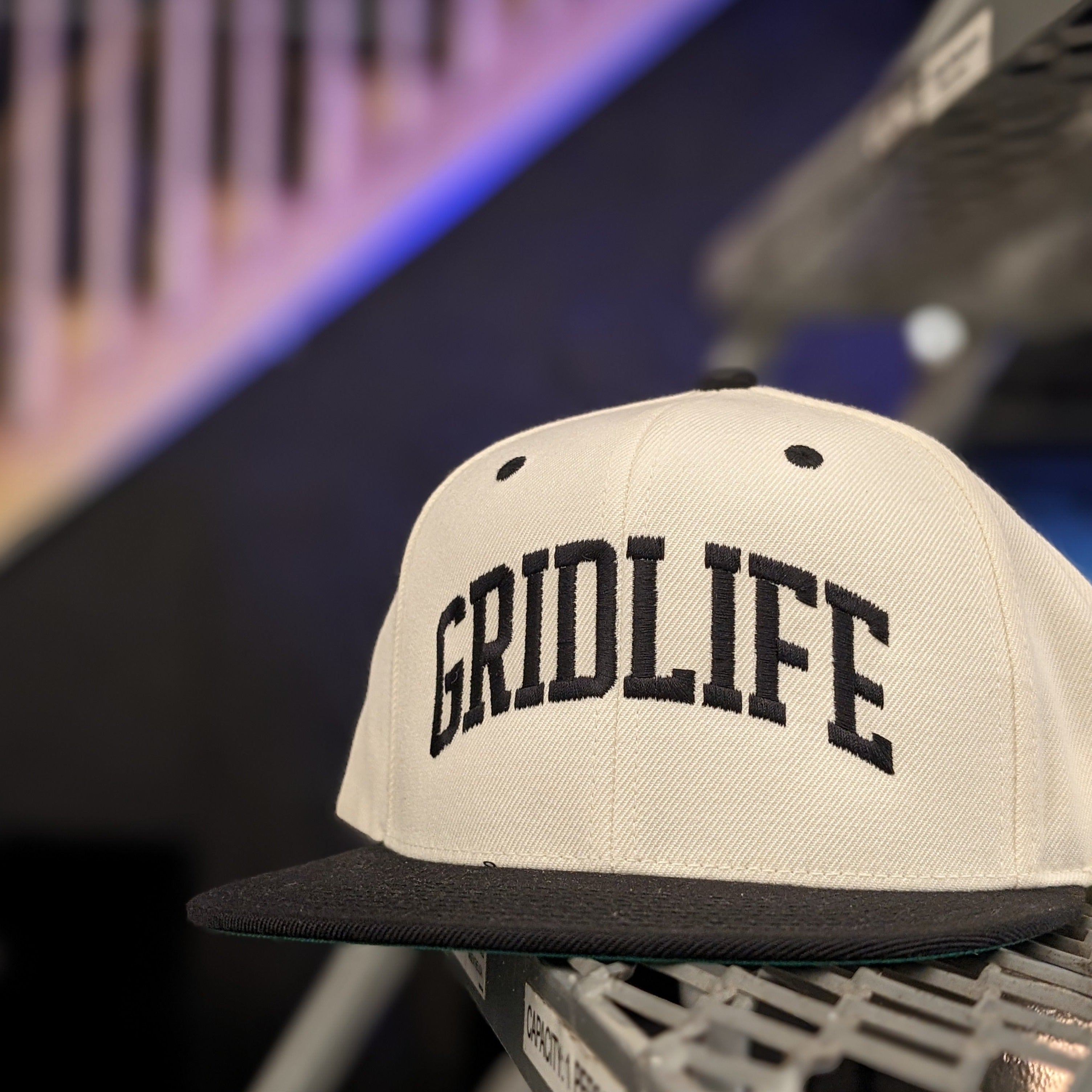 GRIDLIFE college style hat photographed in the warehouse