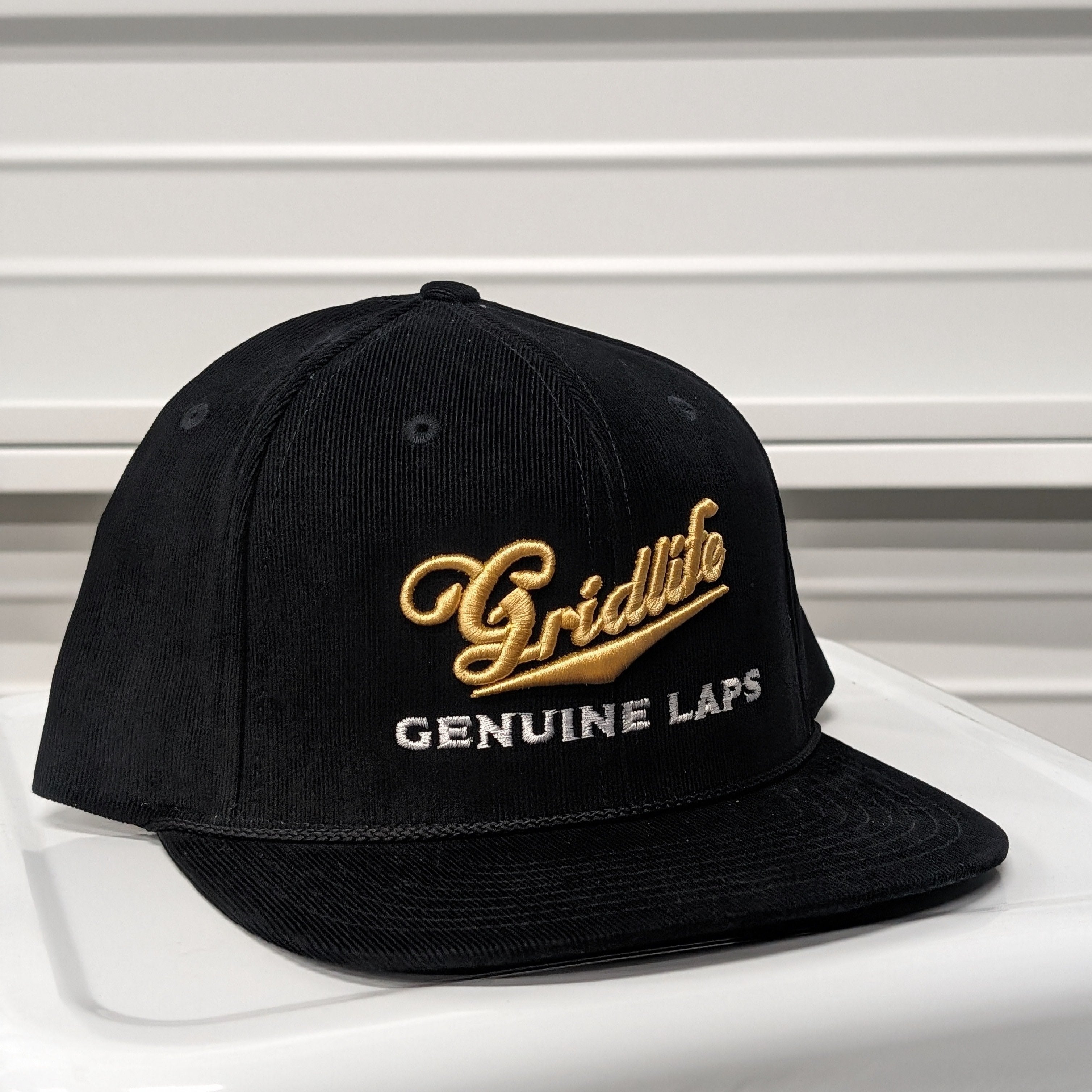 Genuine Laps Black Hat