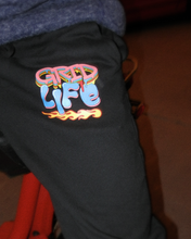 Logo of the GRIDLIFE Acid Drip joggers