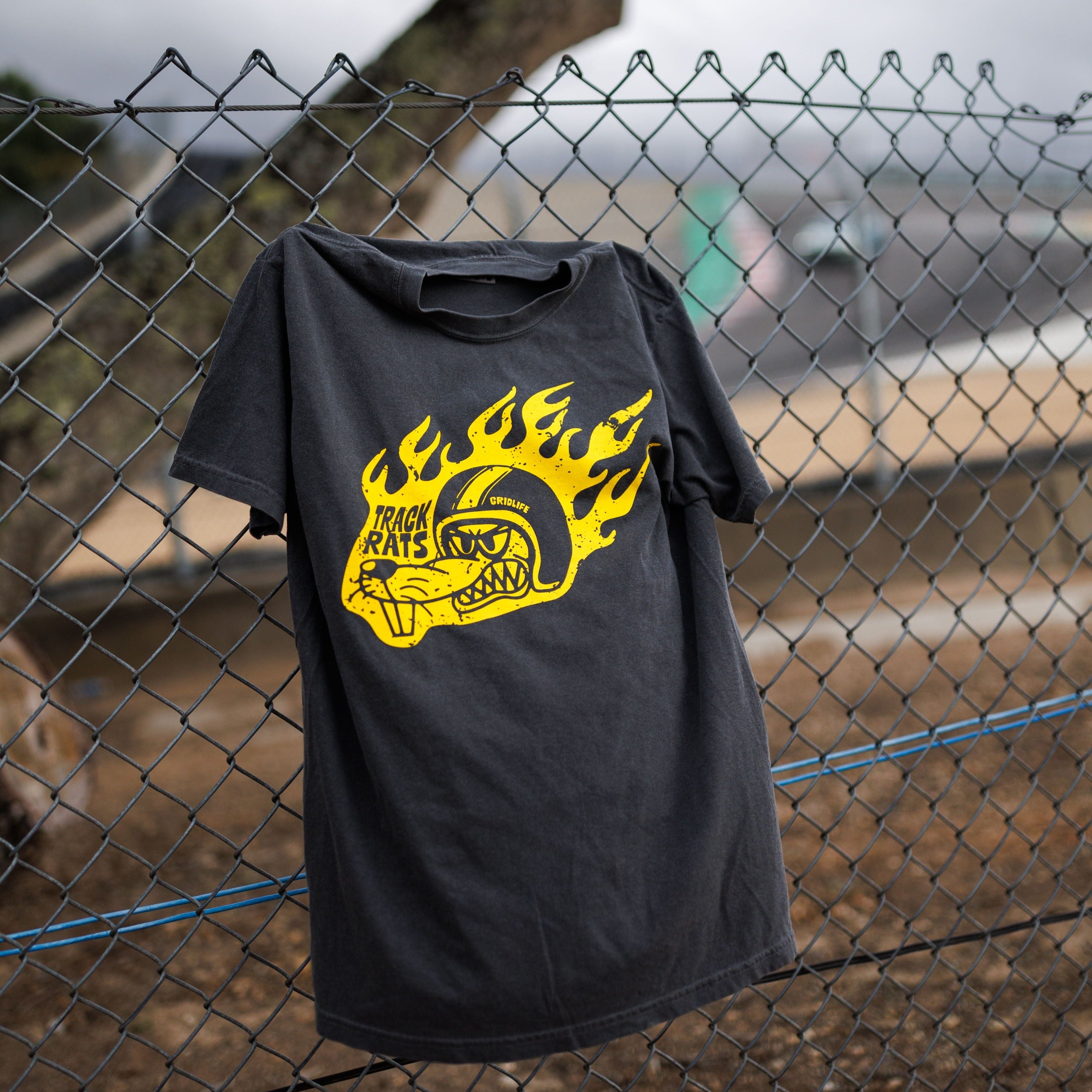 GRIDLIFE Track Rat t-shirt pinned to a fence